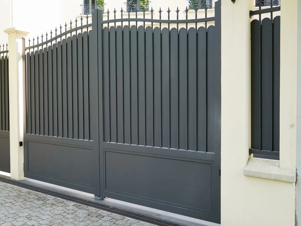 A grey powder-coated aluminium slat gate.