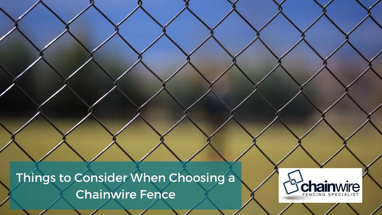 A galvanised chainwire fence with steel posts along a property boundary