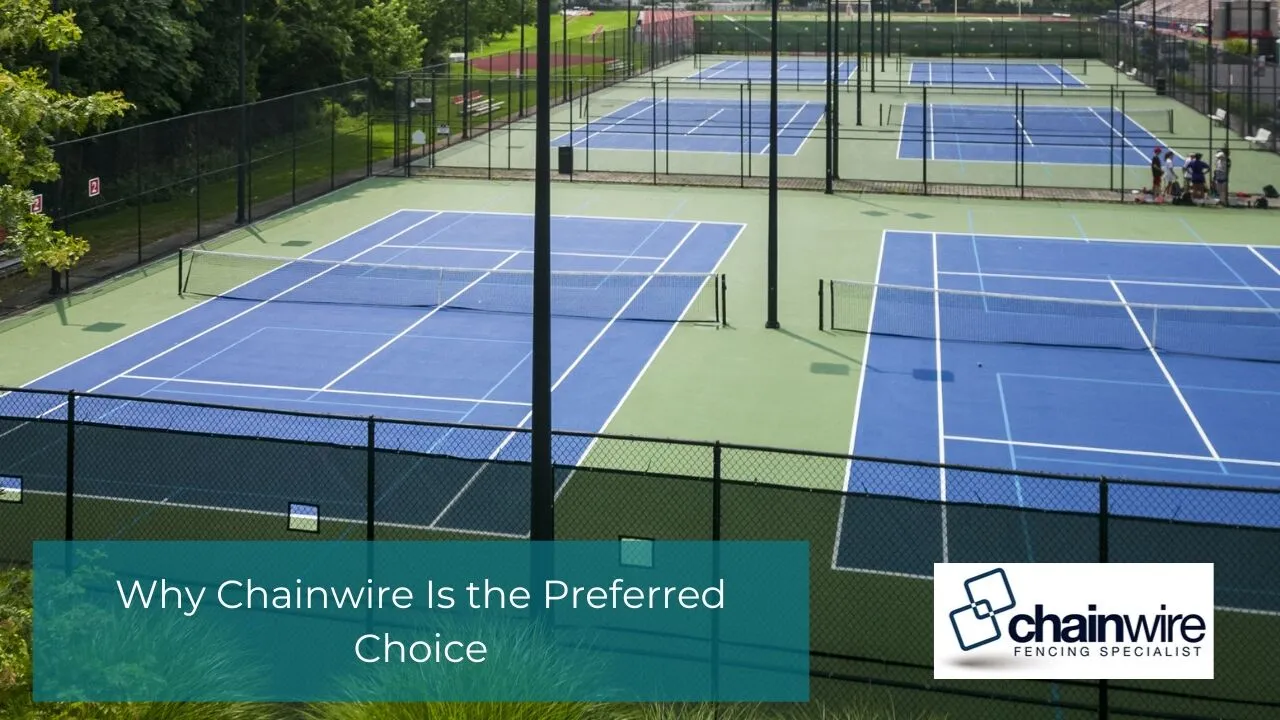 Chainwire fencing around a community sports ground keeping sightlines open