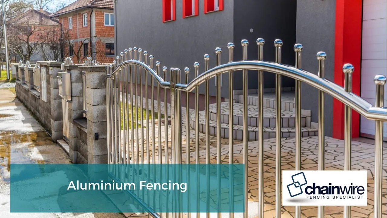 Powder-coated aluminium fencing along the front boundary of a home