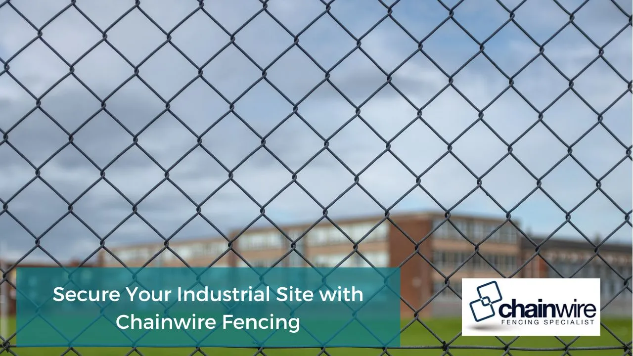 Tall galvanised chainwire perimeter fencing around an industrial site